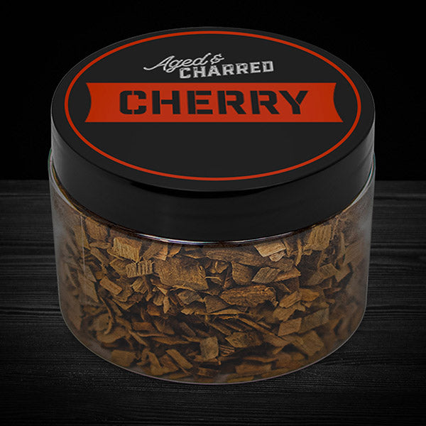 https://www.agedandcharred.com/cdn/shop/files/WoodChips_NewLabelDark_XL_Cherry_600x600_8f77ac1f-c1f0-4c90-9147-a6930cfe5647_600x.jpg?v=1686244219